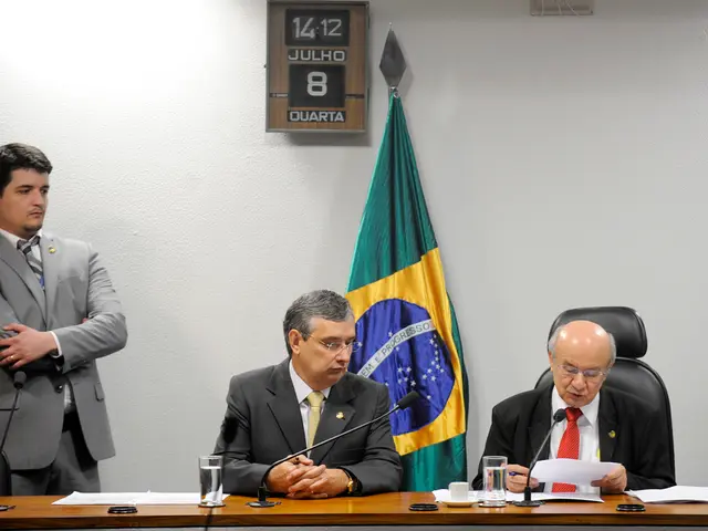 As we can see in the image there is a white color wall, flag and few people over here and there are...